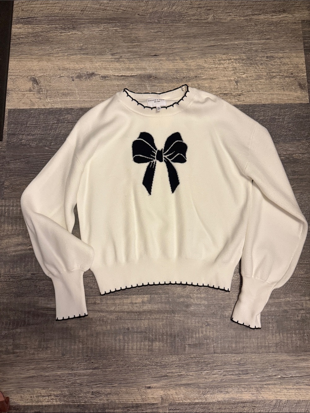 Cream Crewneck Sweater with Black Bow Accent